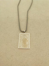 Load image into Gallery viewer, Reverse of silver Black Luster Soldier pendant