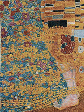 Load image into Gallery viewer, Close-up of floral patterns and woven texture on The Kiss tapestry blanket