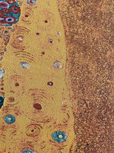 Load image into Gallery viewer, Gold-toned ornamental pattern and woven detail on The Kiss art blanket