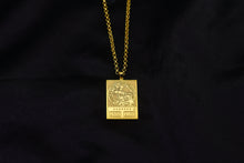 Load image into Gallery viewer, Gold Dark Magician pendant and chain on black background
