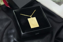Load image into Gallery viewer, Gold Red Eyes Black Dragon pendant reverse in presentation box
