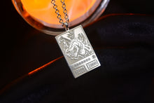 Load image into Gallery viewer, Silver Red Eyes Black Dragon pendant and chain close-up
