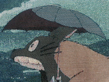 Load image into Gallery viewer, Totoro face and umbrella woven blanket close-up
