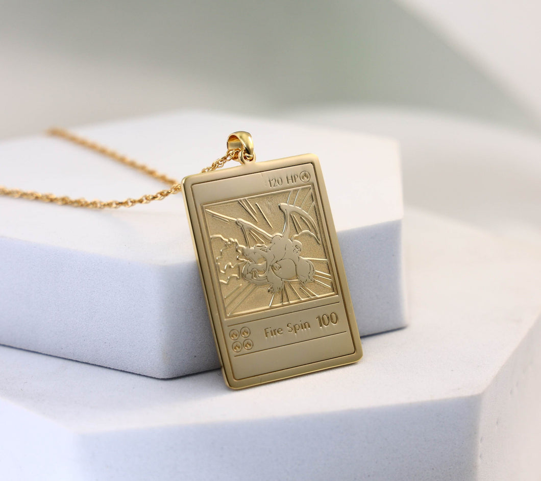Gold/ Silver Charizard Pokemon Pendant & Chain Gold/ Silver Charizard Pokemon Pendant & Chain